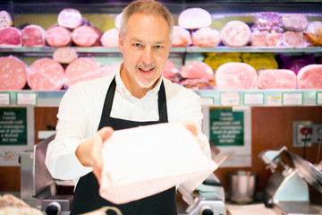 Shopkeeper serving a customer