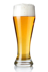 Glass of light beer isolated on a white