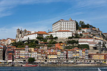 View of Porto city at the riverbank (Ribeira quarter) and wine b