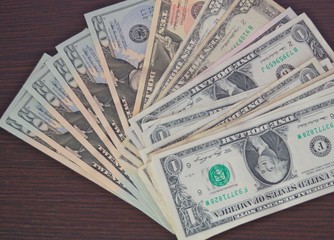 Some US dollars with brown background