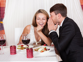 Romantic lovers sharing secrets