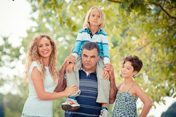 Fototapeta premium Happy Three Generations Family Outdoor