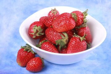 Strawberry in over blue background