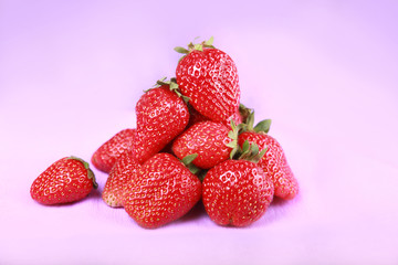 Strawberry in over violet background