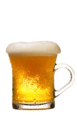 Mug fresh beer with cap of foam isolated on white background