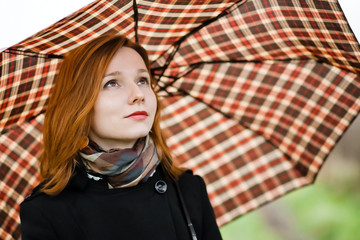 girl with chequered umbrella