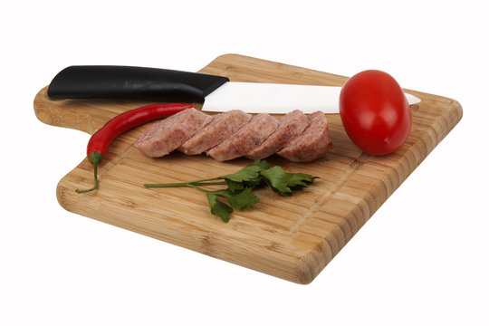 Sausage on kitchen board
