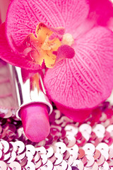 pink lipstick on glitters with orchid