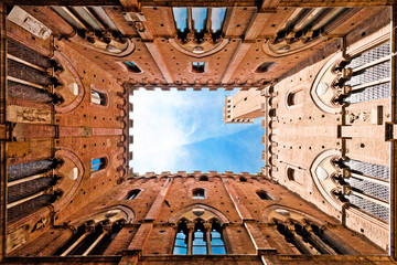Wide angle view of Palazzo Pubblico in Siena, Italy