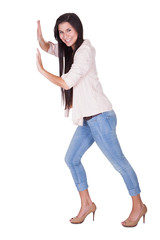 Stylish woman posing in a pushing position