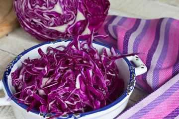Fototapeta premium Fresh uncooked cutted cabbage in bowl