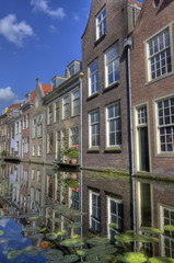 Fototapeta na wymiar Houses on a canal in Delft