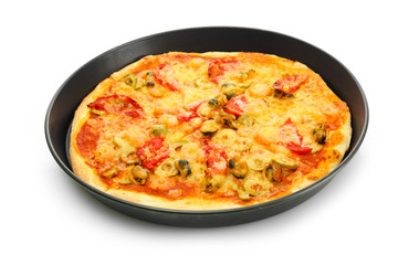 Delicious pizza with seafood in the frying pan isolated on