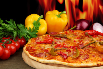 Tasty pepperoni pizza with vegetables