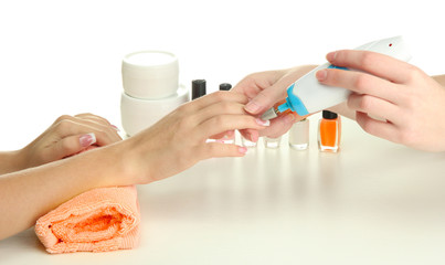 Manicure process in beauty salon, close up
