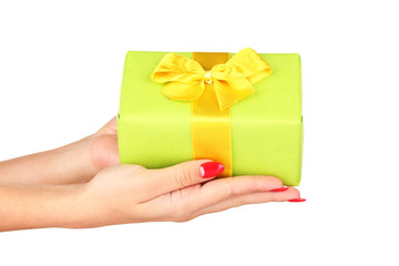 woman holds  box with gift on white background close-up
