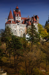 Bran Castle in autumn landscape