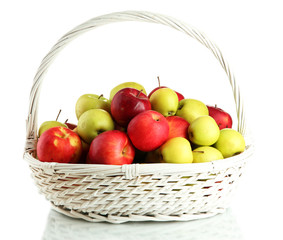 juicy apples in basket, isolated on white
