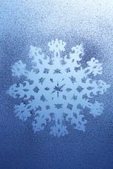 Snowflake pattern on window