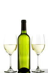 bottle with white wine and glass