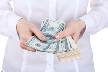American dollars in a women hands on a white background.