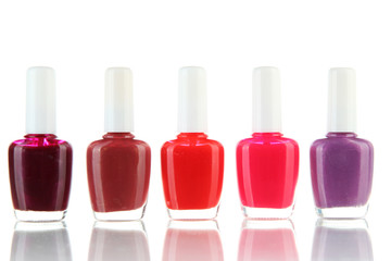 set of nail polishes isolated on white
