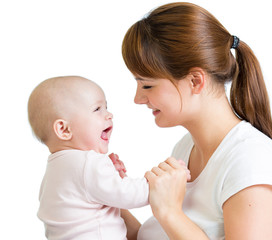 Loving mother playing with her baby