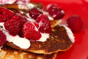 pancakes with raspberry and cream background
