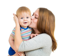 loving mother holding baby boy isolated on white