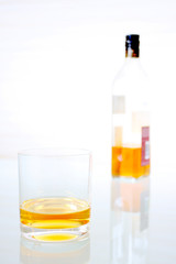 whisky glass with bottle