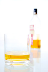 whisky glass with bottle