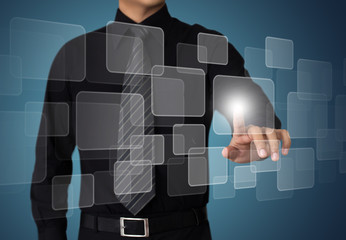 business hand pushing on a touch screen interface