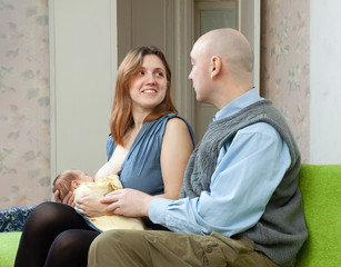 Happy parents with newborn baby