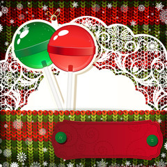 Christmas decorations on handmade knitted background.