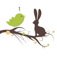 Vogel wunder sich über Osterhasen auf Baum
