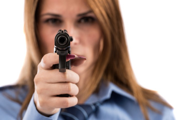 Lady cop posing with gun on white background