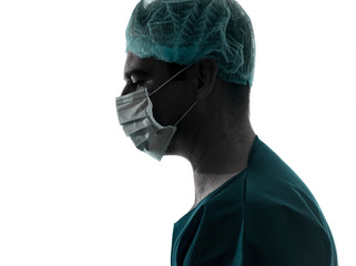 doctor surgeon man profile portrait with face mask silhouette © snaptitude