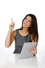 Woman with digital tablet pointing at message