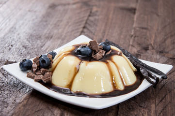 Vanilla Pudding with Berries and Sauce