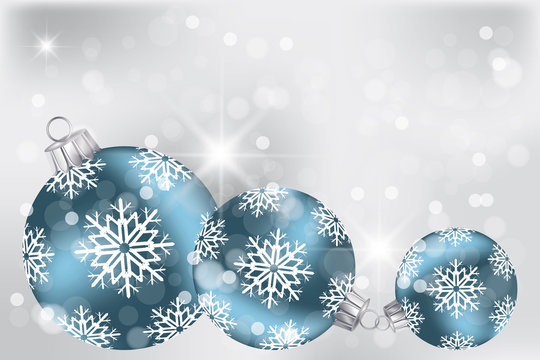 Blue Christmas balls on neutral background