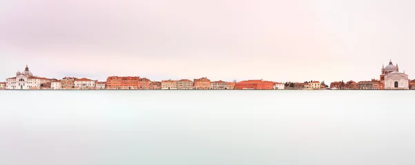 Fototapeten Venice, Giudecca Canal landmark. Panoramic Long exposure photogr © stevanzz