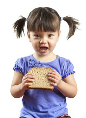 Young child eating sandwich - 47165519