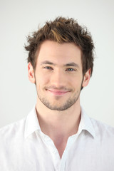 Obraz premium Portrait of smiling man, studio shot