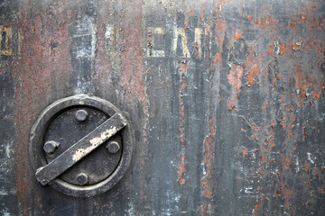 Rusty iron background with valve