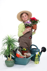 Little girl with plants