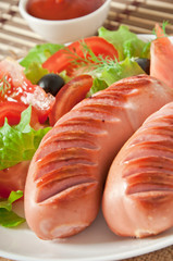 sausages on the grill 