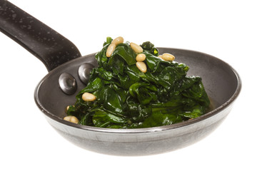Boiled spinach on roasted pan