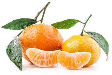 Tangerines with green leaves isolated on white background