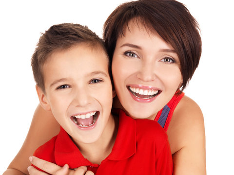 laughing young mother with son 8 year old