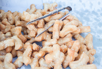 Deep fried dough stick with white sesame